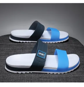 Detail of lightweight EVA slippers showing two-tone straps and anti-slip jagged sole texture