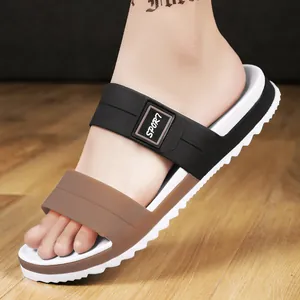 Men's EVA slippers with two-tone brown and black straps and non-slip white sawtooth soles