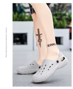Close-up of light grey lightweight EVA clogs with adjustable heel straps and vent holes