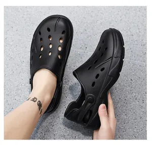 Detail view of black breathable EVA clogs with adjustable heel strap and anti-slip sole