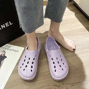 Macro view of light purple breathable clogs showing EVA material and pivot heel strap