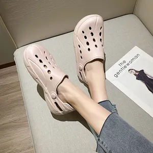 Pink EVA clog sandals featuring breathable holes and a rotatable heel strap for comfort