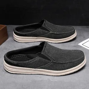 Classic dark grey canvas men's slip-on backless loafers with thick white soles
