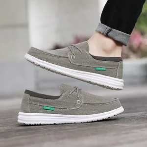 Casual hereninstappers van grijs canvas met witte rubberen zool en klassiek label