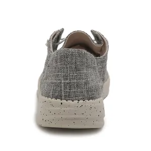 Rear view of grey canvas men loafers featuring textured fabric and speckled thick soles