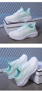 Dettaglio scarpe da corsa in mesh traspirante verde menta e bianco con suola spessa
