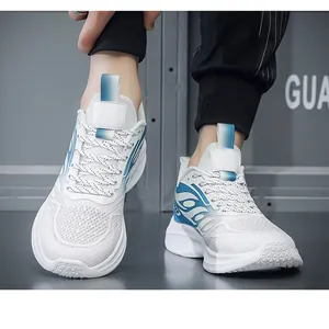 Close-up of breathable mesh running shoes with blue gradient detail on model feet