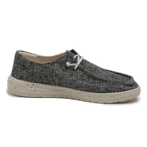 Side view of men's canvas loafers featuring grey melange fabric and speckled white soles