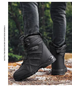 Outdoor close-up of men's winter snow boots with thick faux fur lining and non-slip soles