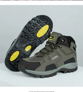 Detail of high-top hiking boots showing anti-slip rubber sole and mesh fabric texture