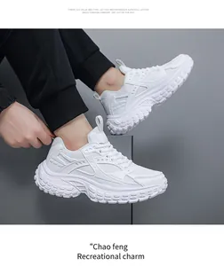 Side view of white chunky dad sneaker with breathable mesh and thick rubber sole