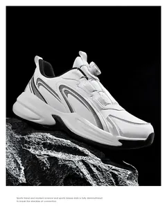 Detail of white athletic shoe with a rotary knob lacing system on a stone pedestal