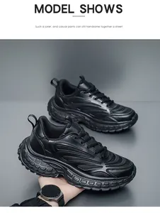 Detail of chunky black sneakers featuring breathable mesh and thick anti-slip soles
