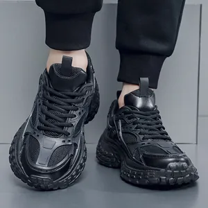Chunky black platform sneakers for men and women featuring breathable mesh and leather