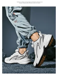 Close-up of white platform sneakers with rotary buckle system and wave pattern