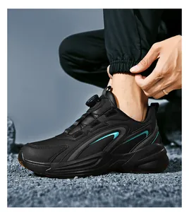 Detail of athletic shoe with rotary buckle closure and shock-absorbing thick sole