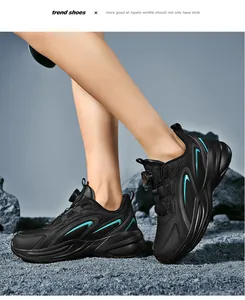 Close-up of black running shoes with teal accents and innovative quick-dial lacing system