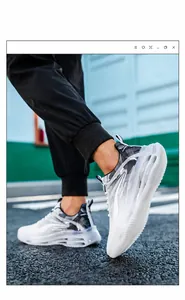 Detail of breathable mesh sneakers featuring thick cushioned soles and Sports fashion text
