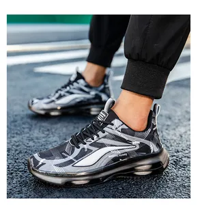 Detail of chunky cushioned sole and breathable knitted mesh on men's fashion sneakers