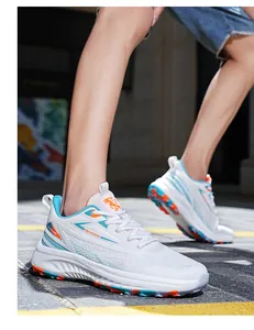 Close-up of lightweight breathable mesh running shoes with blue and orange accents
