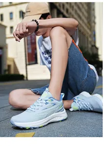 Close-up of lightweight summer running shoe with breathable mesh and thick EVA sole