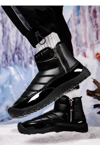 Detail of waterproof quilted nylon snow boots with side zipper and non-slip rubber sole