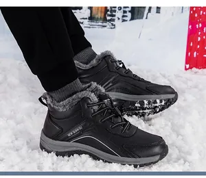 Detail of warm faux fur lining and non-slip sole on men's winter outdoor hiking boots