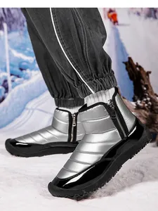 Macro shot of silver waterproof snow boot with warm lining and non-slip rubber sole