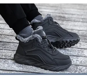 Close-up of men's winter snow boots with warm faux fur lining and anti-slip thick soles