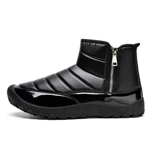Waterproof black winter snow boots for men with dual zippers and warm quilted down fabric