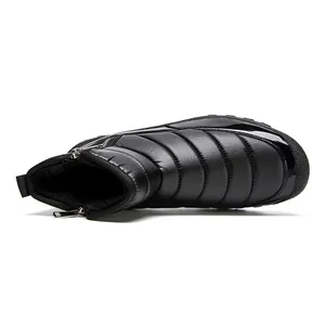 Detail of waterproof quilted snow boot with warm plush lining and side zipper closure