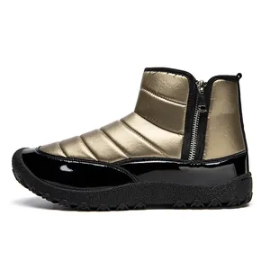 Detail of waterproof puffer snow boots featuring side metal zipper and non-slip rubber sole