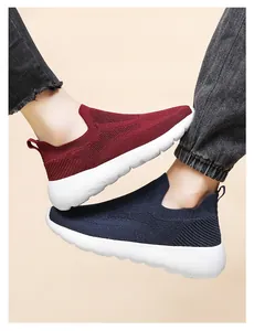 Detail of 3D breathable knit fabric and slip-on design on running shoes in two colors