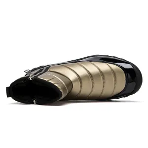 Detail of waterproof quilted snow boot with warm plush lining and metallic zipper closure