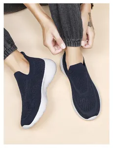 Top-down view of navy 3D fly knit running shoes with white cushioned sole for men and women