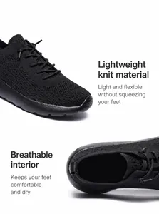 Détail macro du tissu fly-knit respirant et structure interne des baskets noires