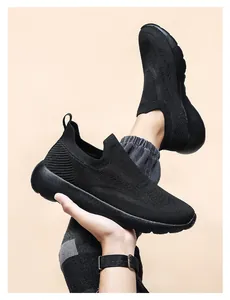 Detail of black 3D knit breathable running shoe showing flexible mesh and soft sole texture