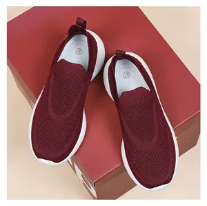 Detail view of wine red 3D knit sneakers with white soles and size 37 printed insole