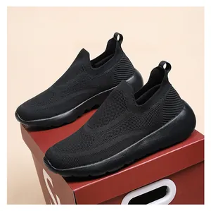 Close-up of black 3D fly-knit breathable mesh upper and slip-on collar of running shoes