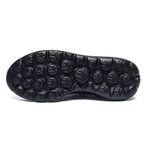 Macro view of non-slip outsole with 3D star pattern on lightweight running sneakers