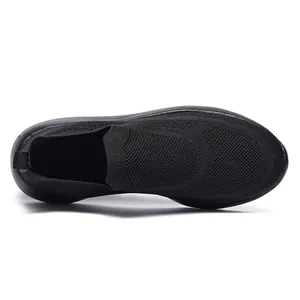 Top view of black 3D fly knit slip-on sneakers with breathable mesh and heel pull tab