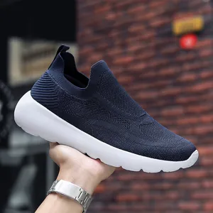 Navy blue 3D knit slip-on sneakers with thick white cushioning sole for casual running