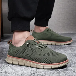 Close-up of olive green knit loafers showing breathable texture and brown leather details