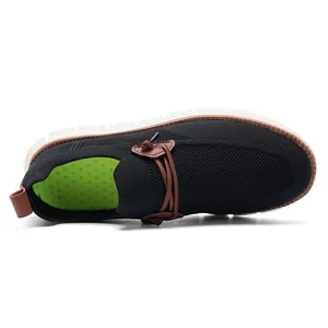 Top view of breathable knit loafer showing the green non-slip insole and brown trim