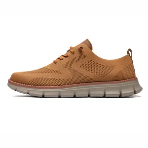 Macro side view of brown knit breathable upper with wave texture on men's casual loafer