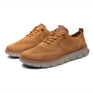 Detail of breathable knitted brown men's loafers showing texture and anti-slip rubber soles