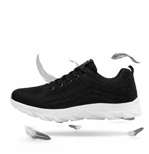Detail of lightweight breathable fly-knit mesh sneaker upper with white flexible sole