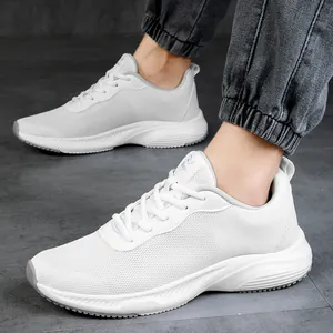 White breathable mesh running sneakers for men with wave textured sole and grey logo