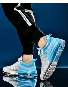 Detail of blue gradient mesh sneaker featuring full-length air cushion and rotary buckle