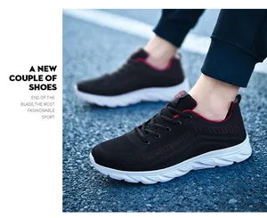 Close-up of breathable black knit upper and thick white sole on a lightweight running shoe